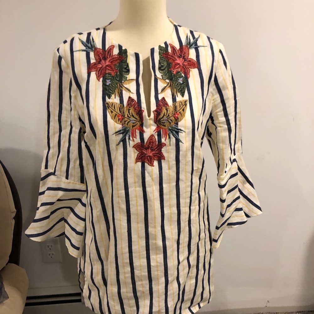 Linen top with embroidered floral details